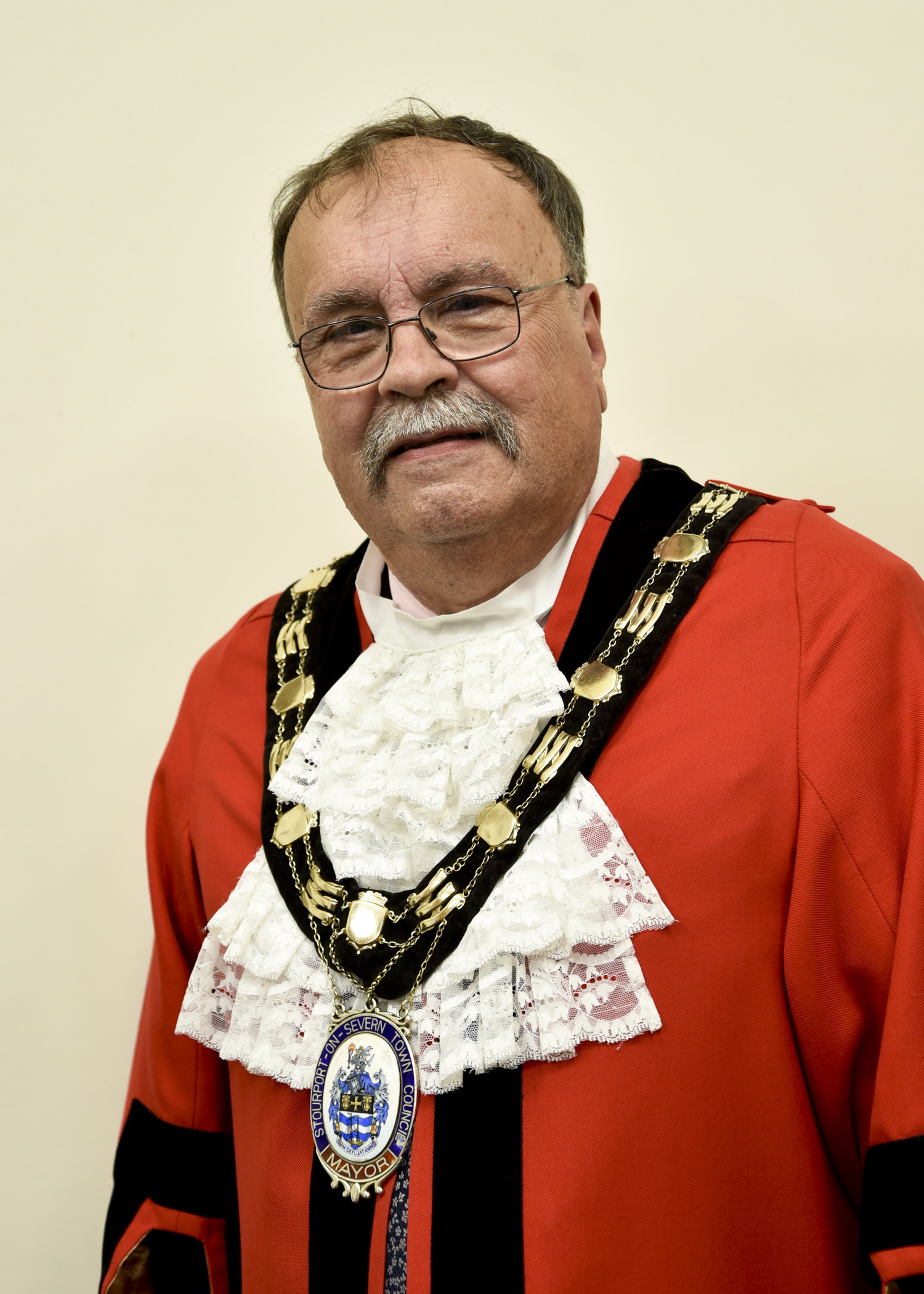 man in mayoral ceremonial robe and chain