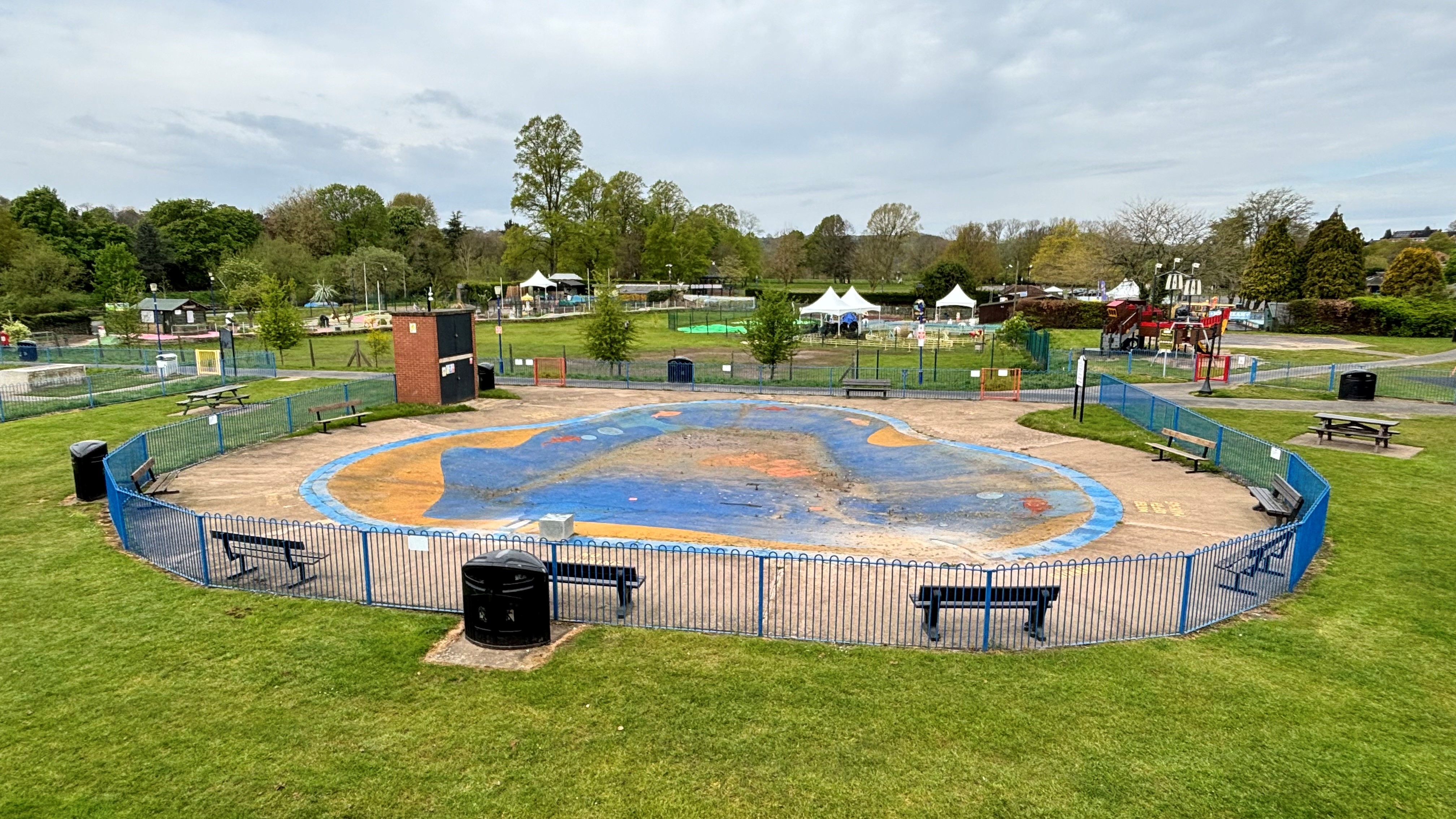 empty paddling pool in park